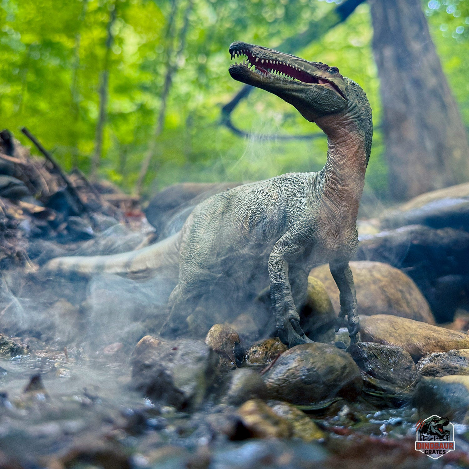 Papo Suchomimus Dinosaur Figure in a forest setting with trees and rocks